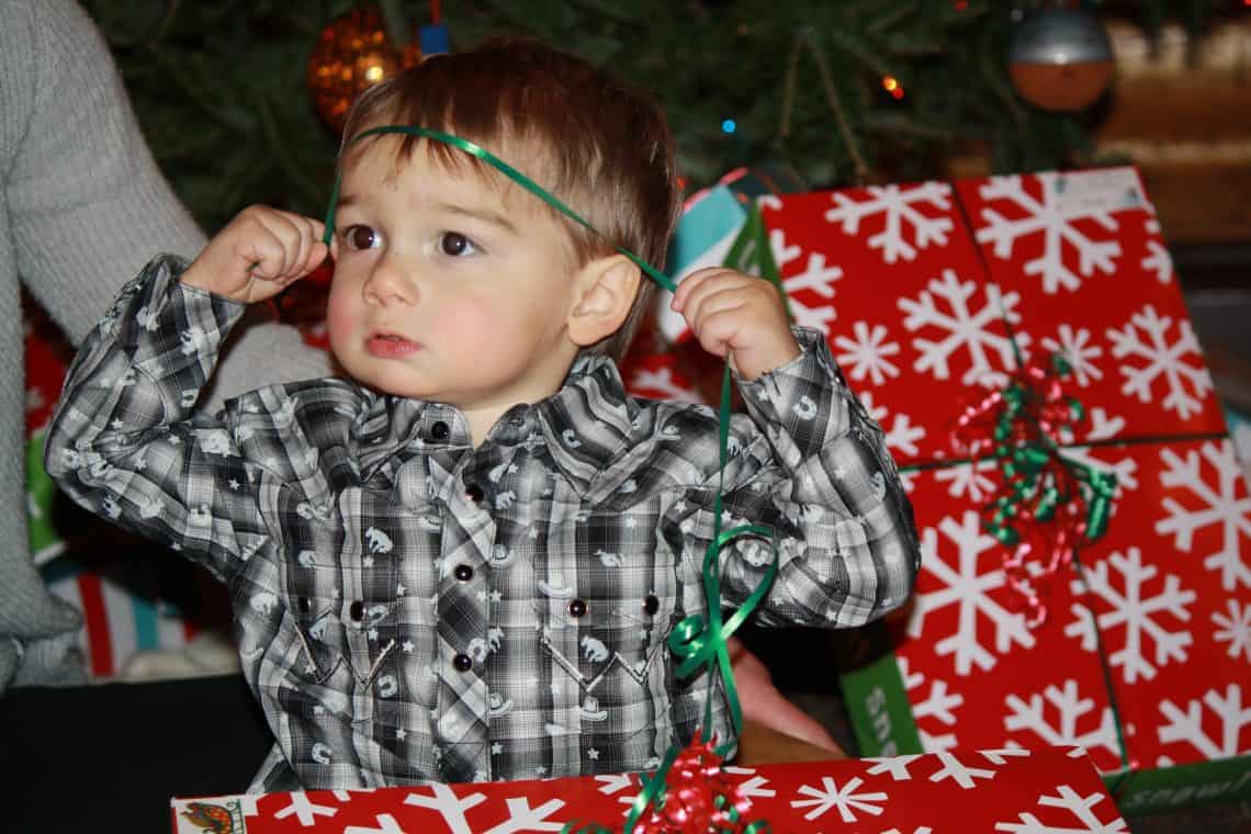 I don't think he new that he was just supposed to open his present... he kept trying to rewrap himself!