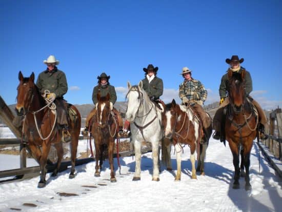 Head Wrangler Bill Fisher, And Wrangler Tyler Klees out for a ride with the first of the winter wranglers.