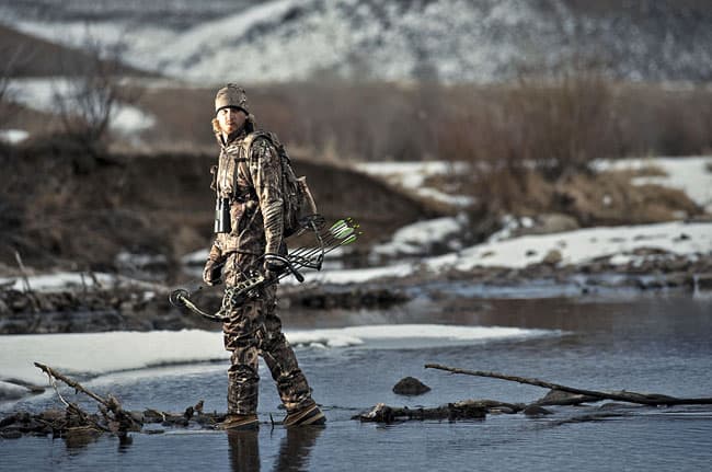 Parker crosses the river "in search of a buck"