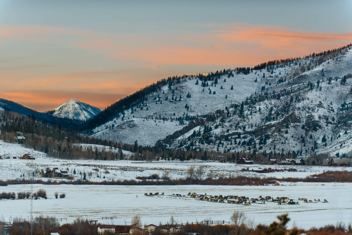 Sunset over the snow dusted ridges of C Lazy U