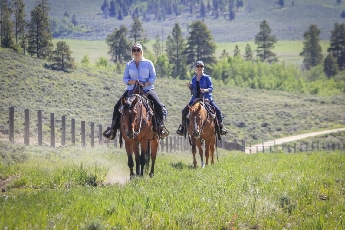 2 women on horses