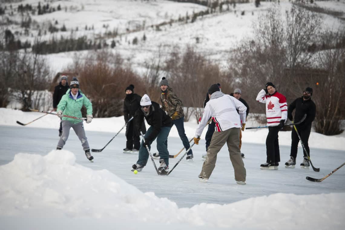 Guest play a game of hockey at C Lazy U