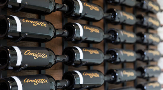 Amizetta wine bottles in the winery tasting room