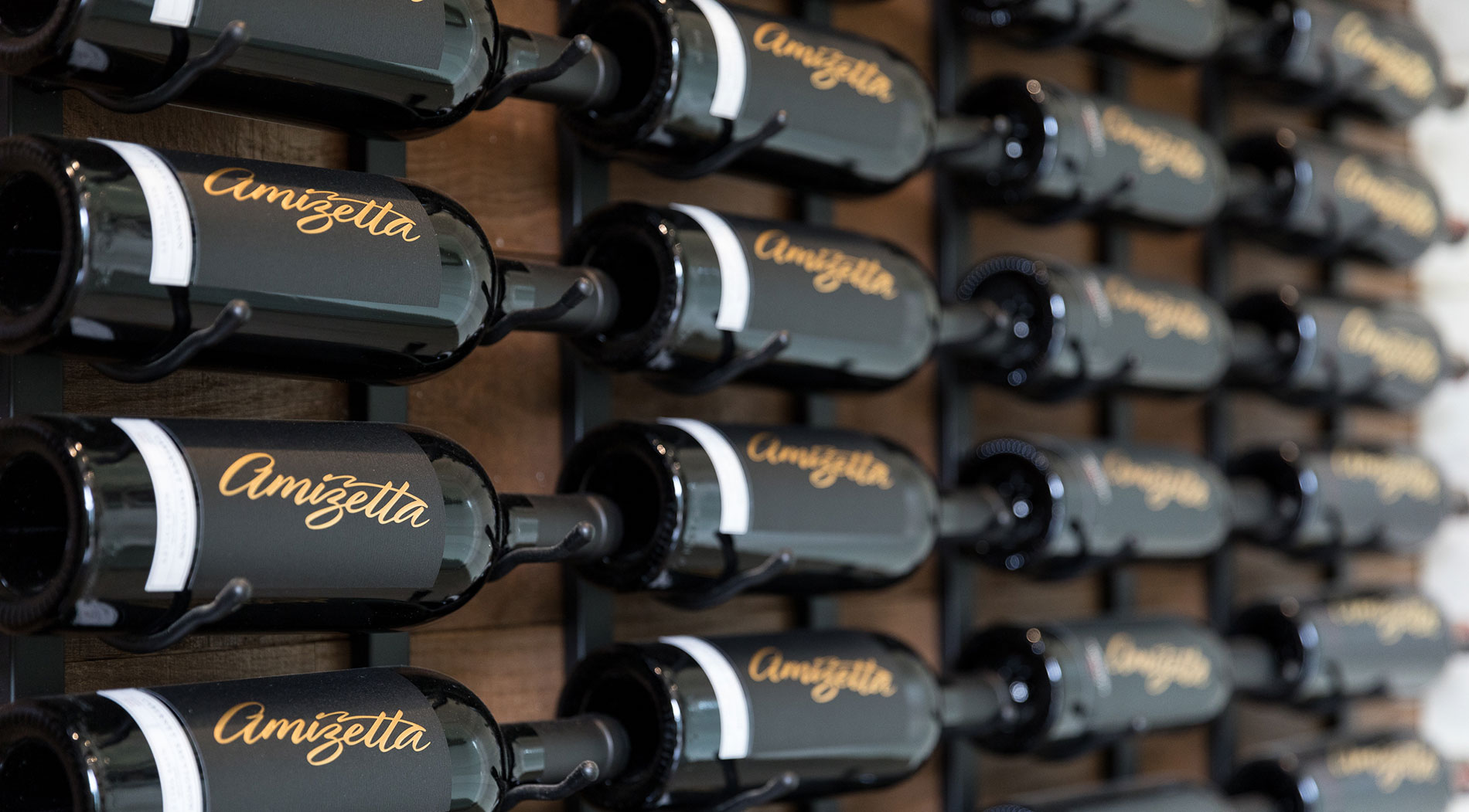 Amizetta wine bottles in the winery tasting room