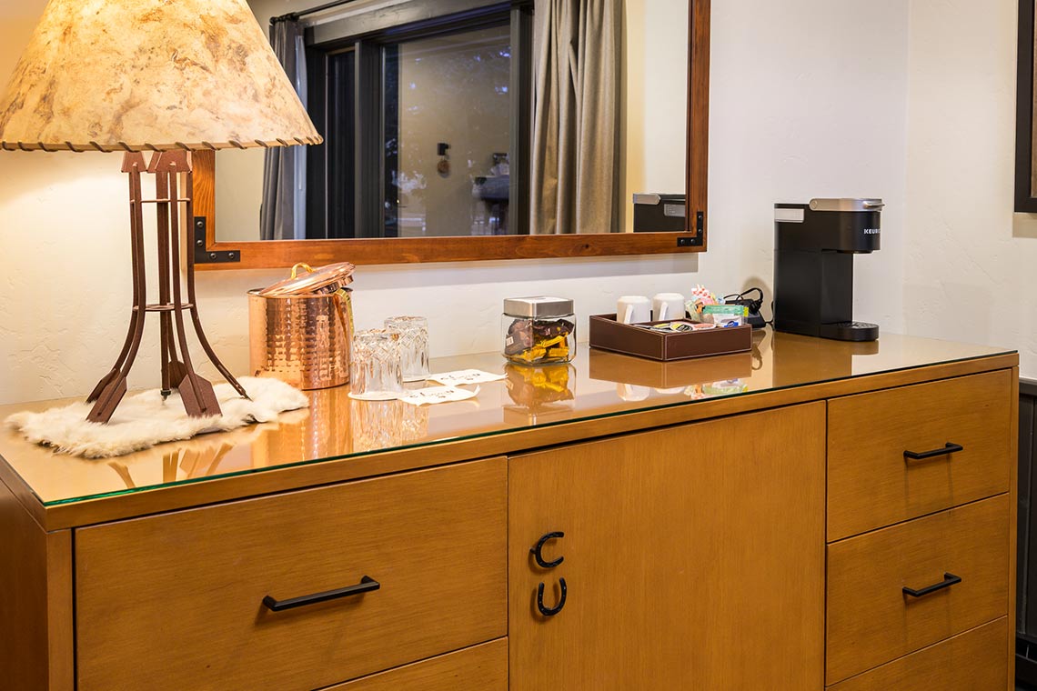 The dresser in Roundup A, showing various amenities