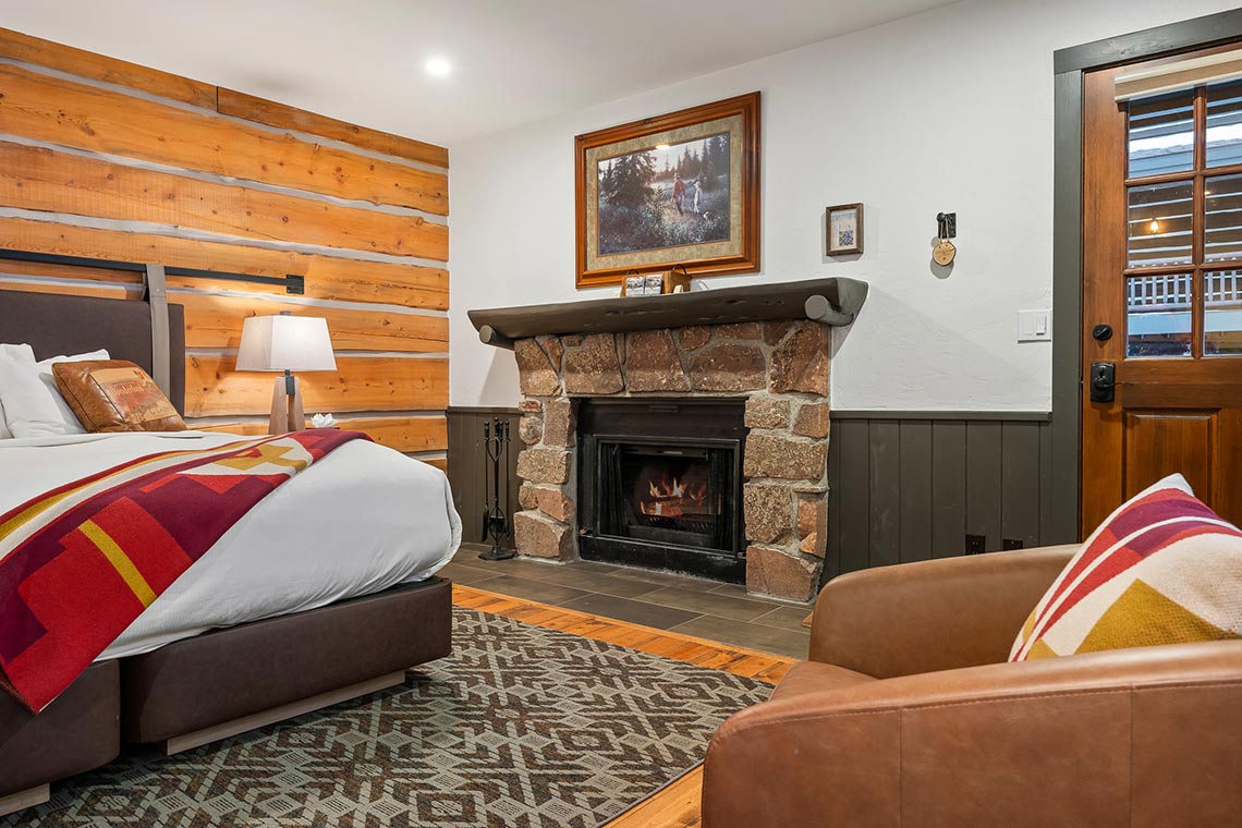 Roundup B fireplace near the bed and sitting area