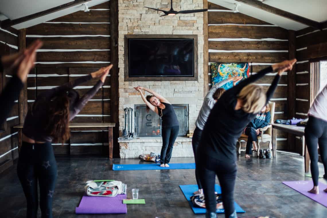 women stretching during yoga