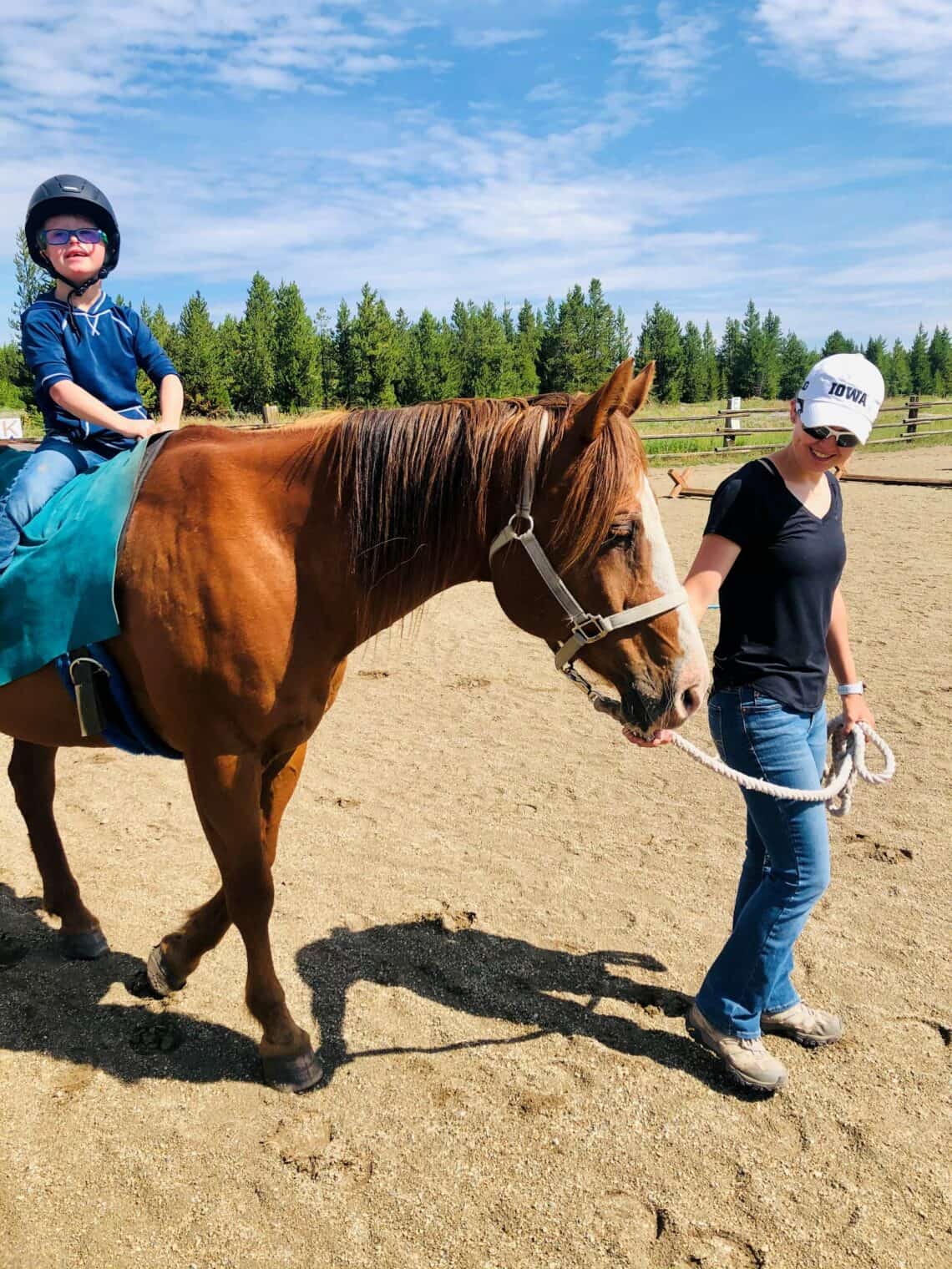 Cowboy and Oliver at C Lazy U Ranch in Granby, Colorado.