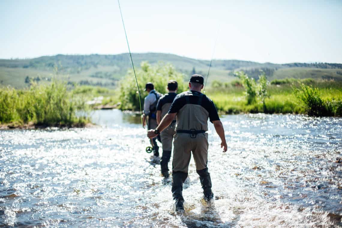 Three men flyfishing