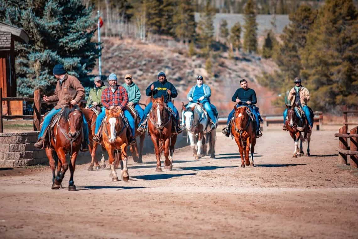 Riding horses at a Semper Fi Fund retreat