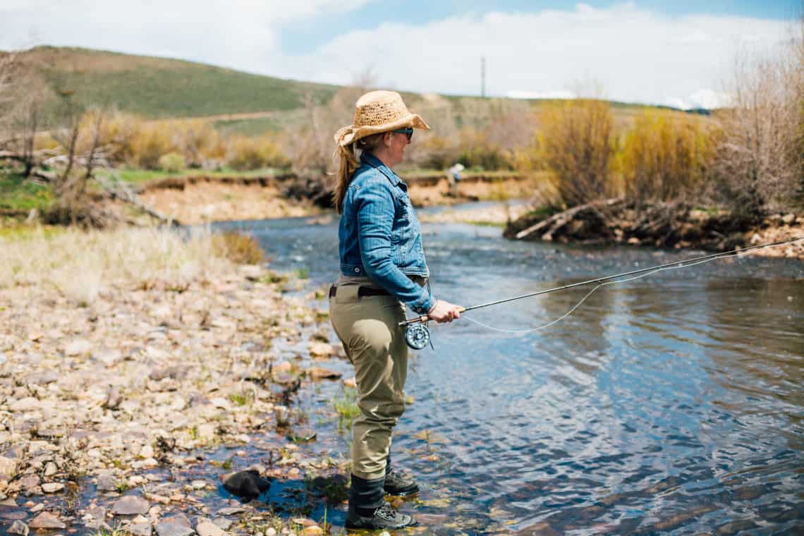 woman fly fishing 