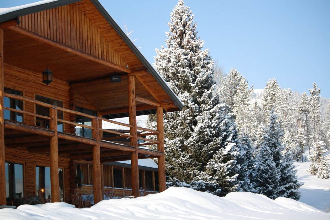 fresh snow on cabin