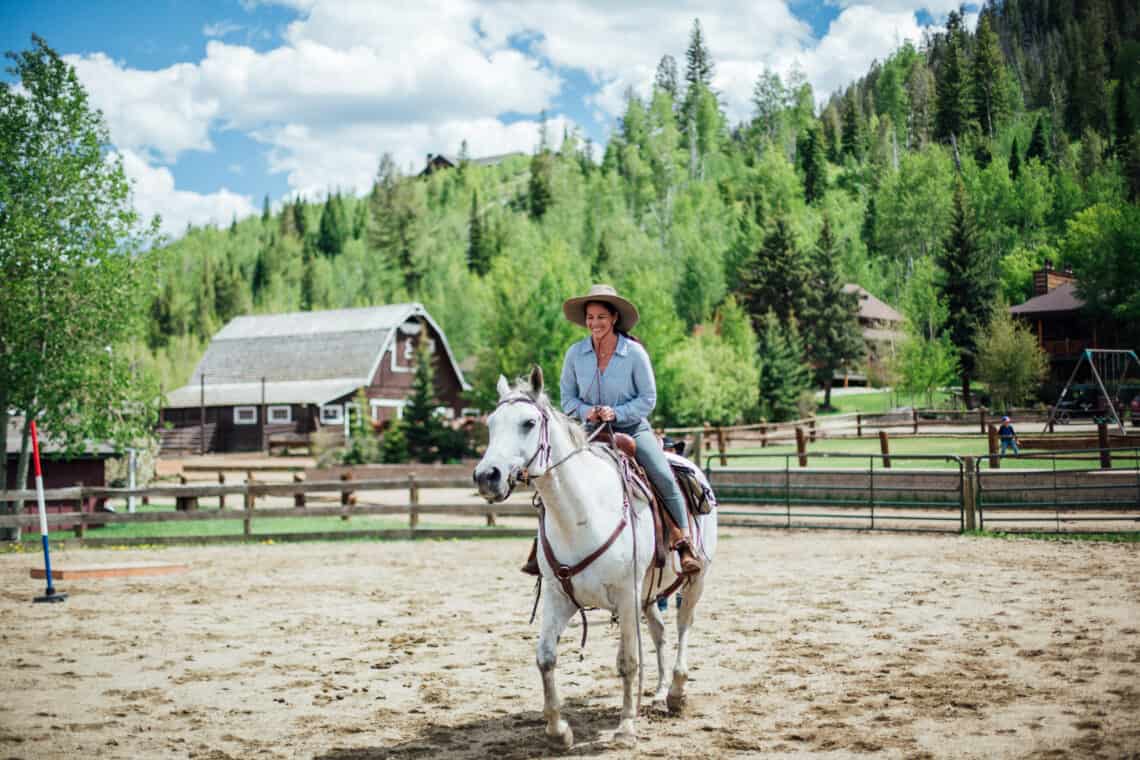 Woman riding horse