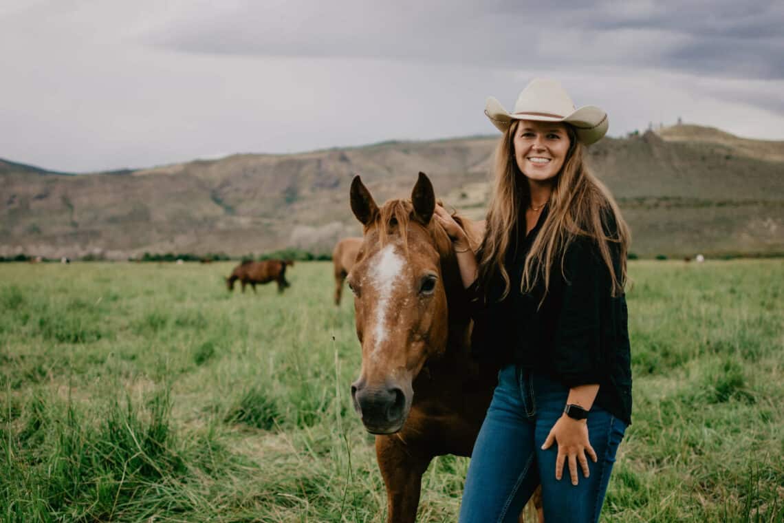 Michelle Ried, the Children’s Program Assistant Manager at C Lazy U with a horse