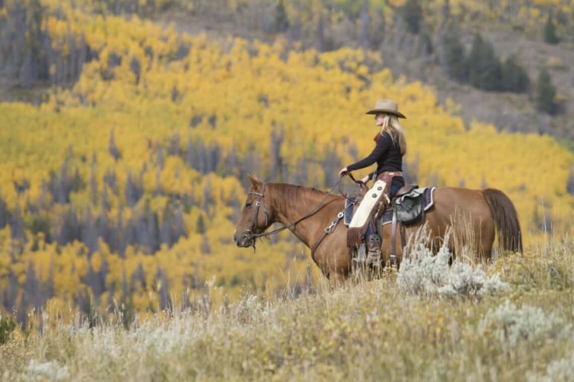 horseback riding in the Colorado mountains