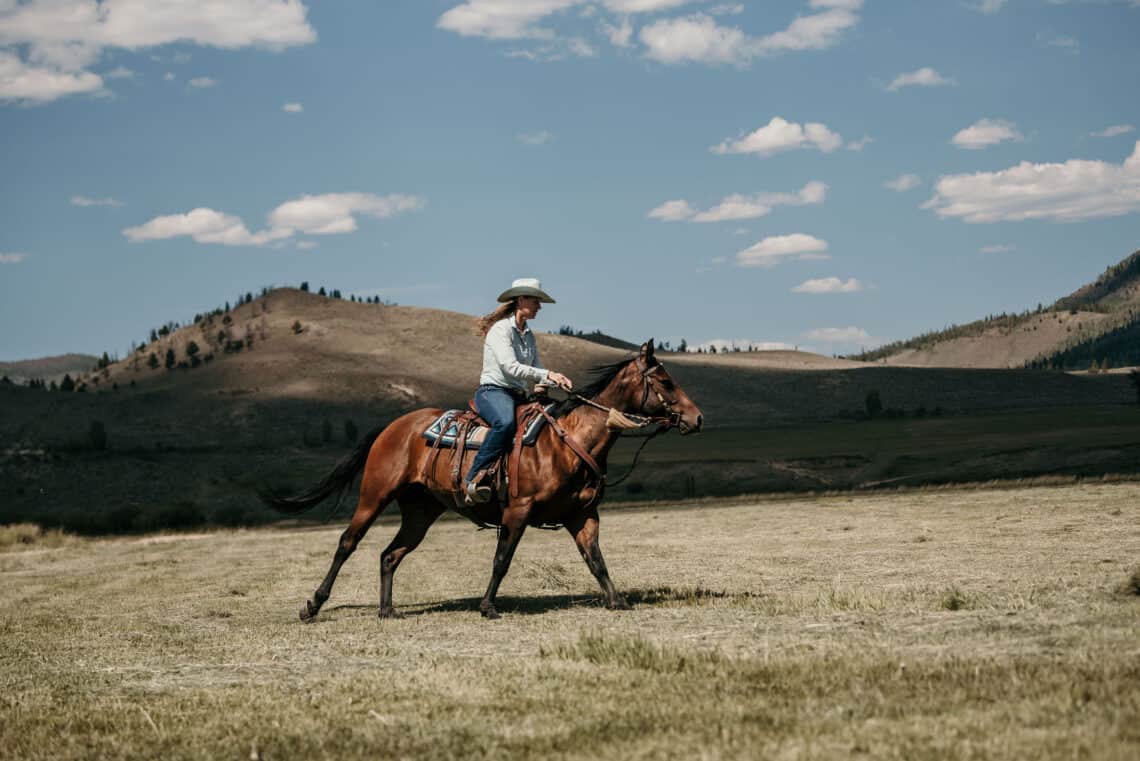 tami burkett riding at C lazy U dude ranch and horseback riding vacation resort