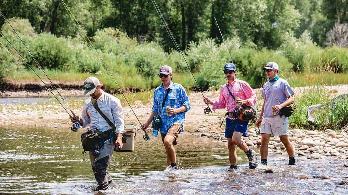 Happy fishermen heading home across the river.