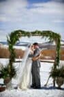 Winter wedding, portrait at the wedding arch