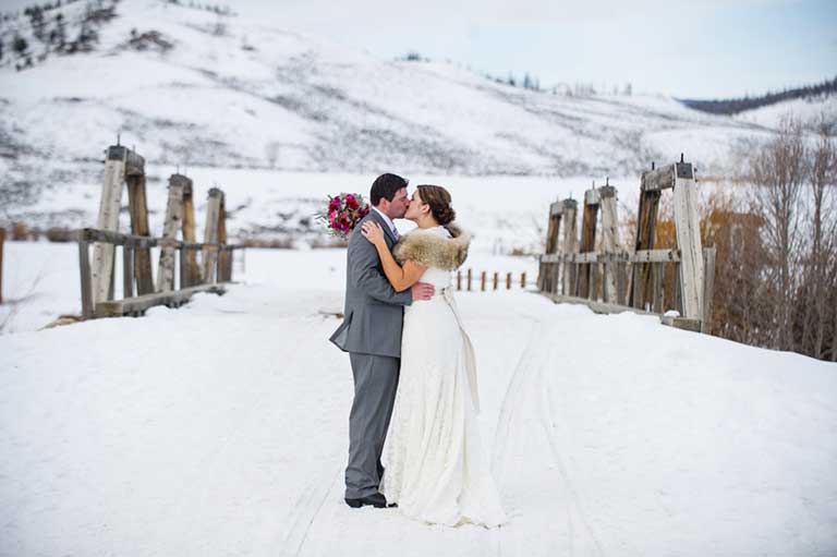 married couple kissing at C Lazy U Ranch