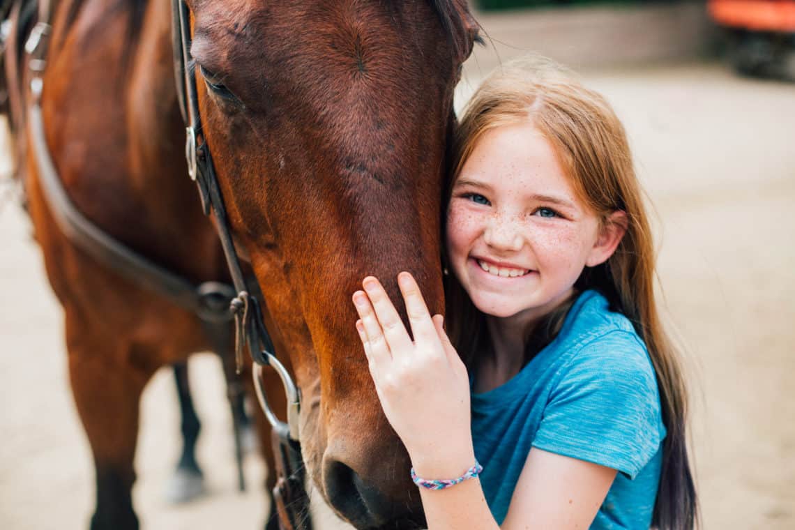 close up of girl with horse