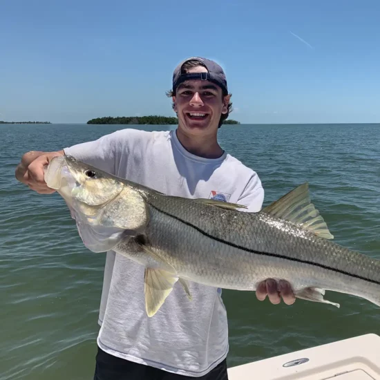 Tommy Pollock, a fishing guide at C Lazy U Ranch