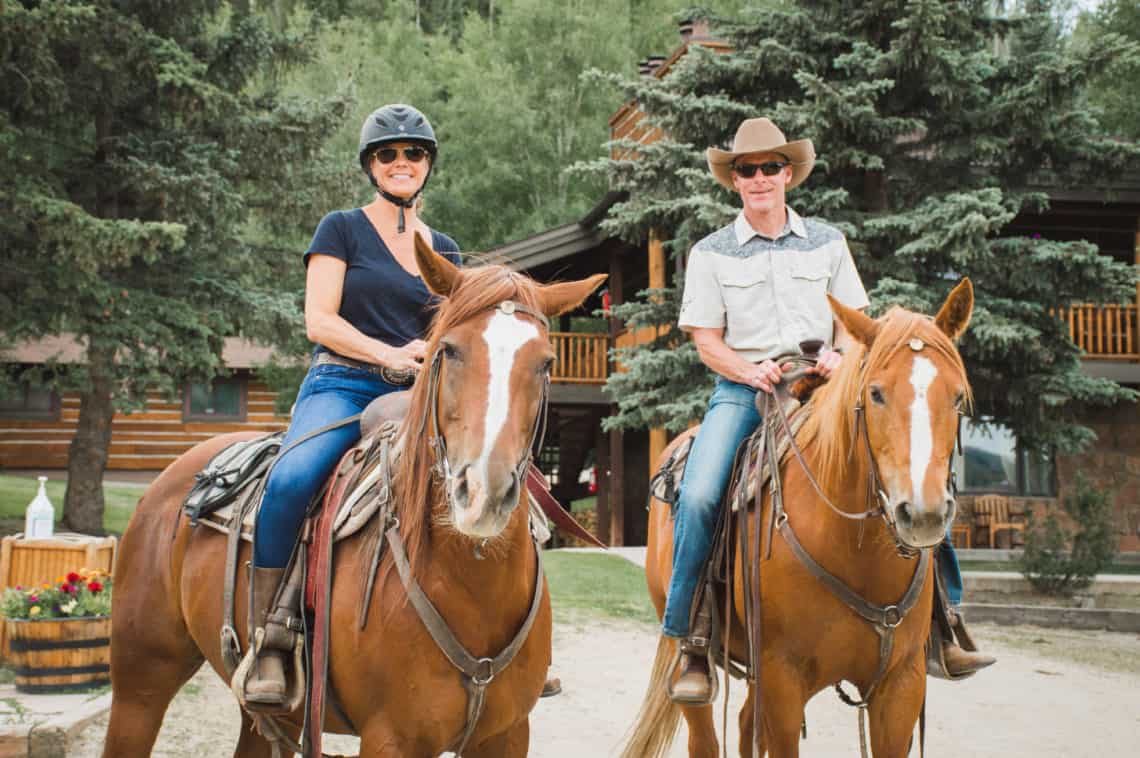 couple riding horses