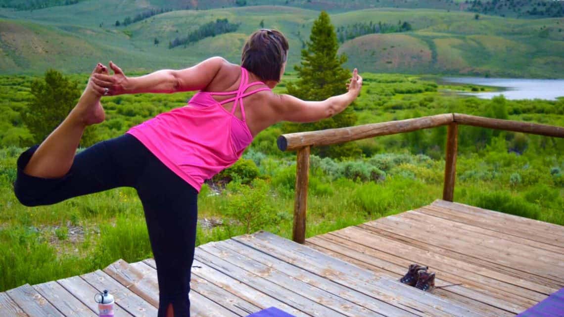 woman in pink doing yoga