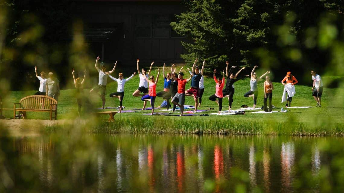 yoga outside by lake