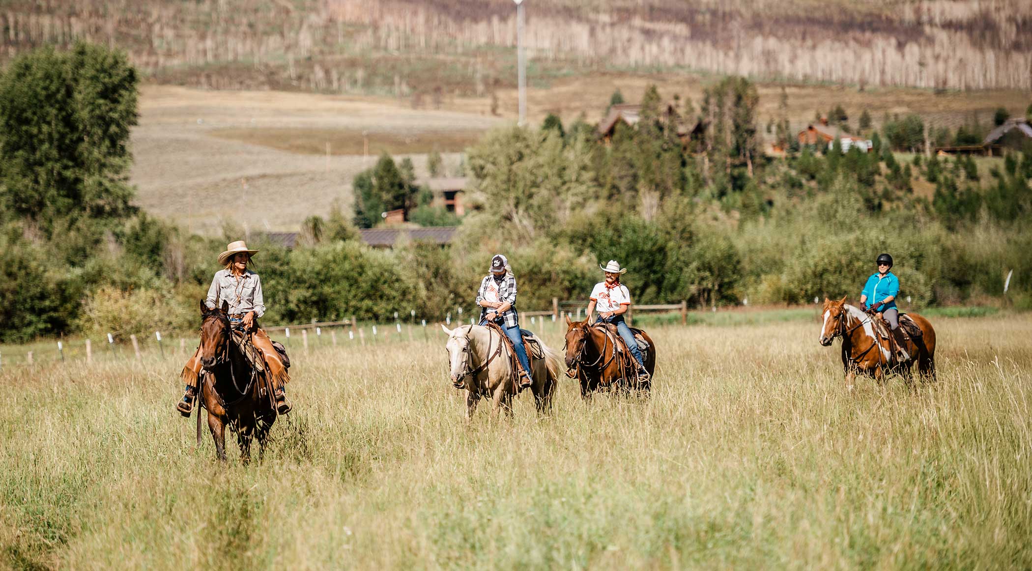 Adults out on a trail ride in October