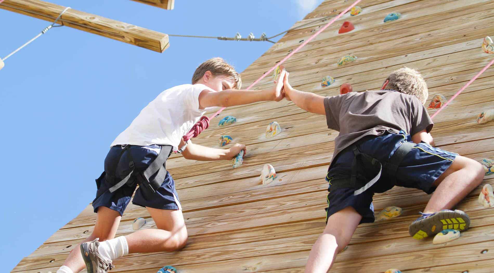 boys on a climbing wall