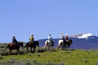 It's easy to gain some perspective on life riding under the big, open sky on your horseback riding vacation.