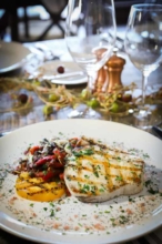 Pork chops cooked expertly on the grill are just one of the lunch and dinner entree options at our all-inclusive dude ranch.