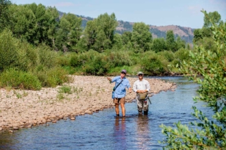 Get a taste of the beautiful Rocky Mountains by taking part in our guided fly fishing trips with trained dude ranch experts. fly fishing with a guide