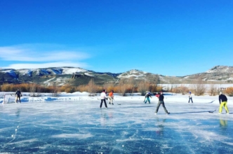 Ice skating on our pond is not like skating on any other pond! We use a real Zamboni on it to make it as smooth as a rink so you practice your moves. playing ice hockey in the afternoon