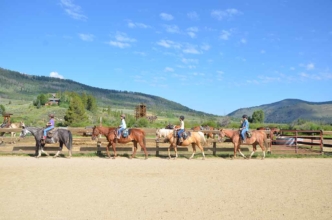 Our Colorado dude ranch includes an arena for practice to make sure everyone is ready for their horseback riding trip.