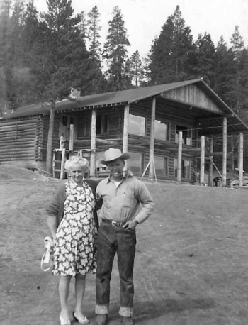 After two decades of running the ranch, in 1945 the Smillies sold it to Ivor Carl "Pete" Peterson, shown here with his mother Martha, and the newly built Lodge.