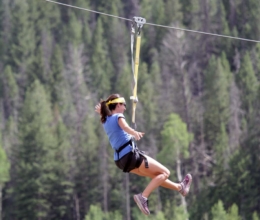 Soar through the air on our exhilirating zipline, just one of the many variety of activities available to you on your colorado guest ranch vacation.