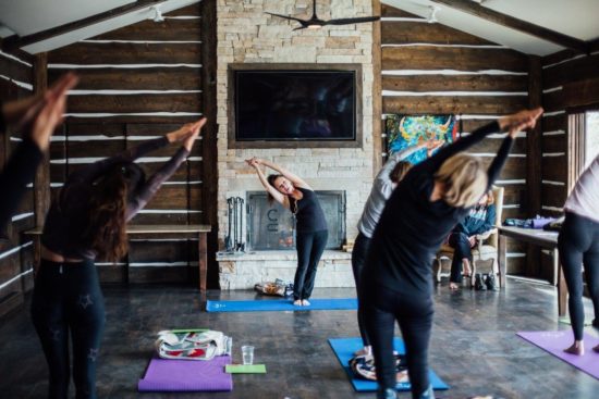 More women doing yoga at retreat at C Lazy U Ranch