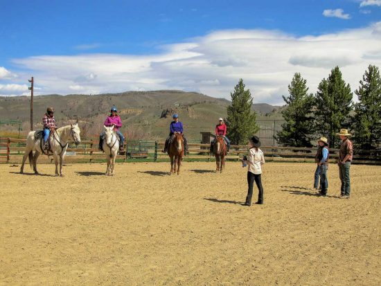 Cathy Woods instructs the riders during the Body, Mind, Equine retreat