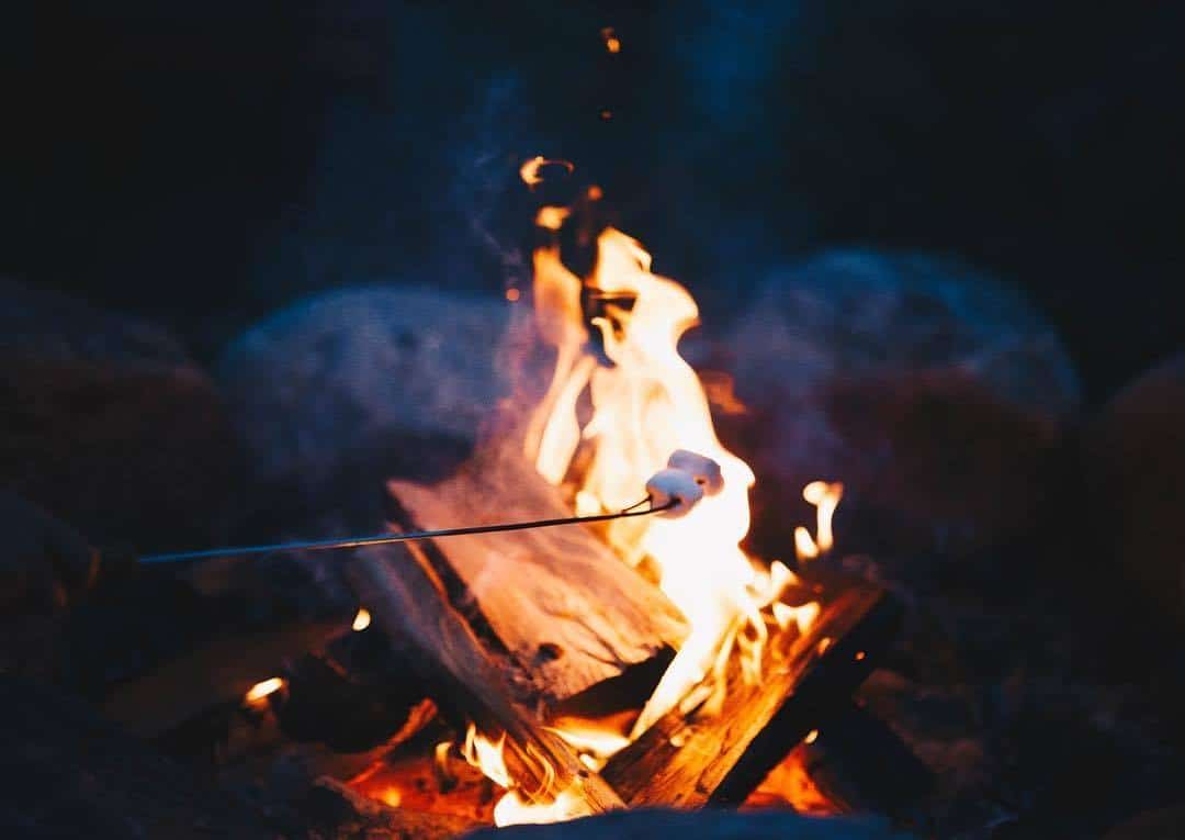 Roasting marshmallow on a bonfire