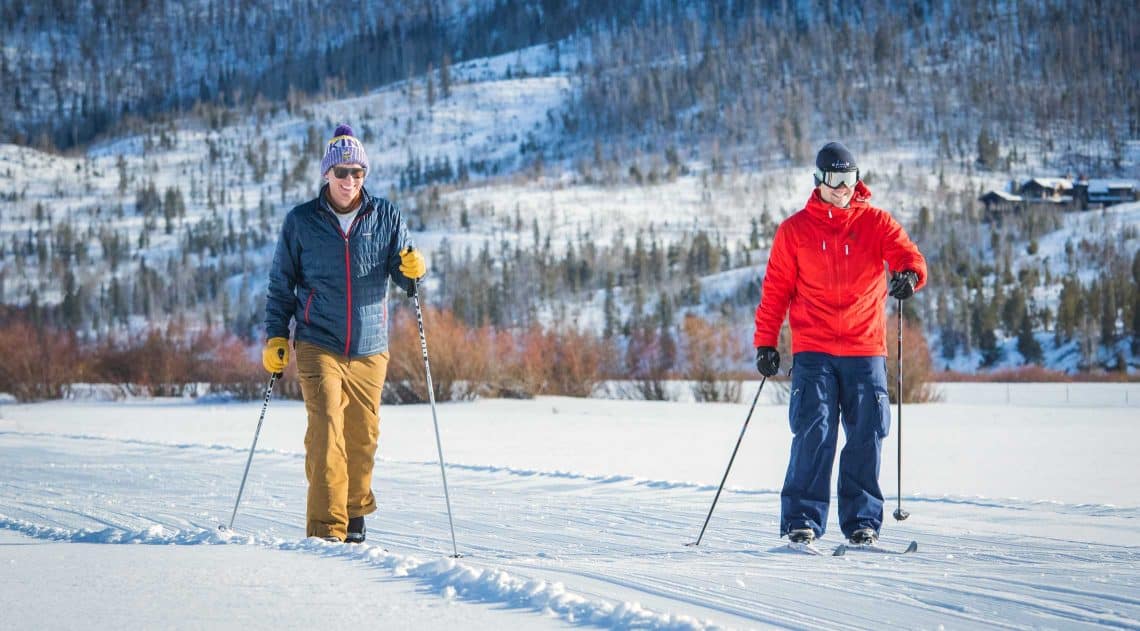 Two men cross country skiing