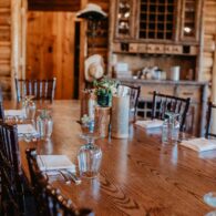 Dining table set for dinner in the Main Lodge