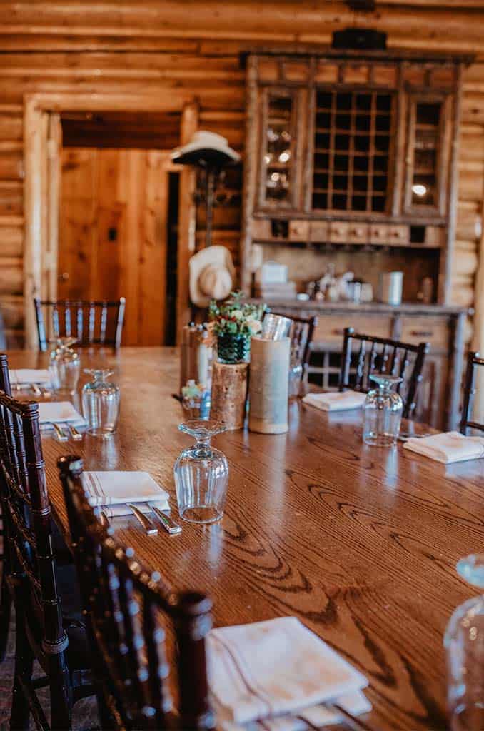 Dining table set for dinner in the Main Lodge