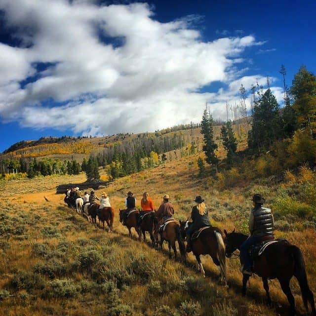 Horseback trail ride in Fall