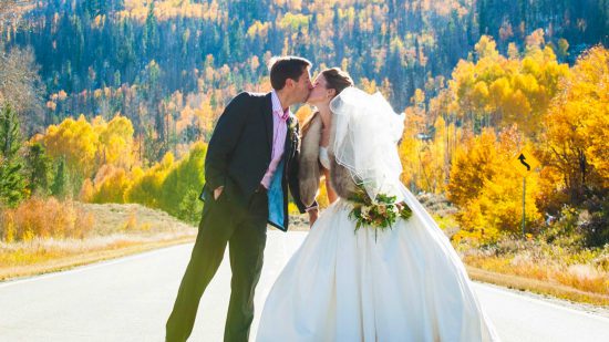 Fall wedding kiss