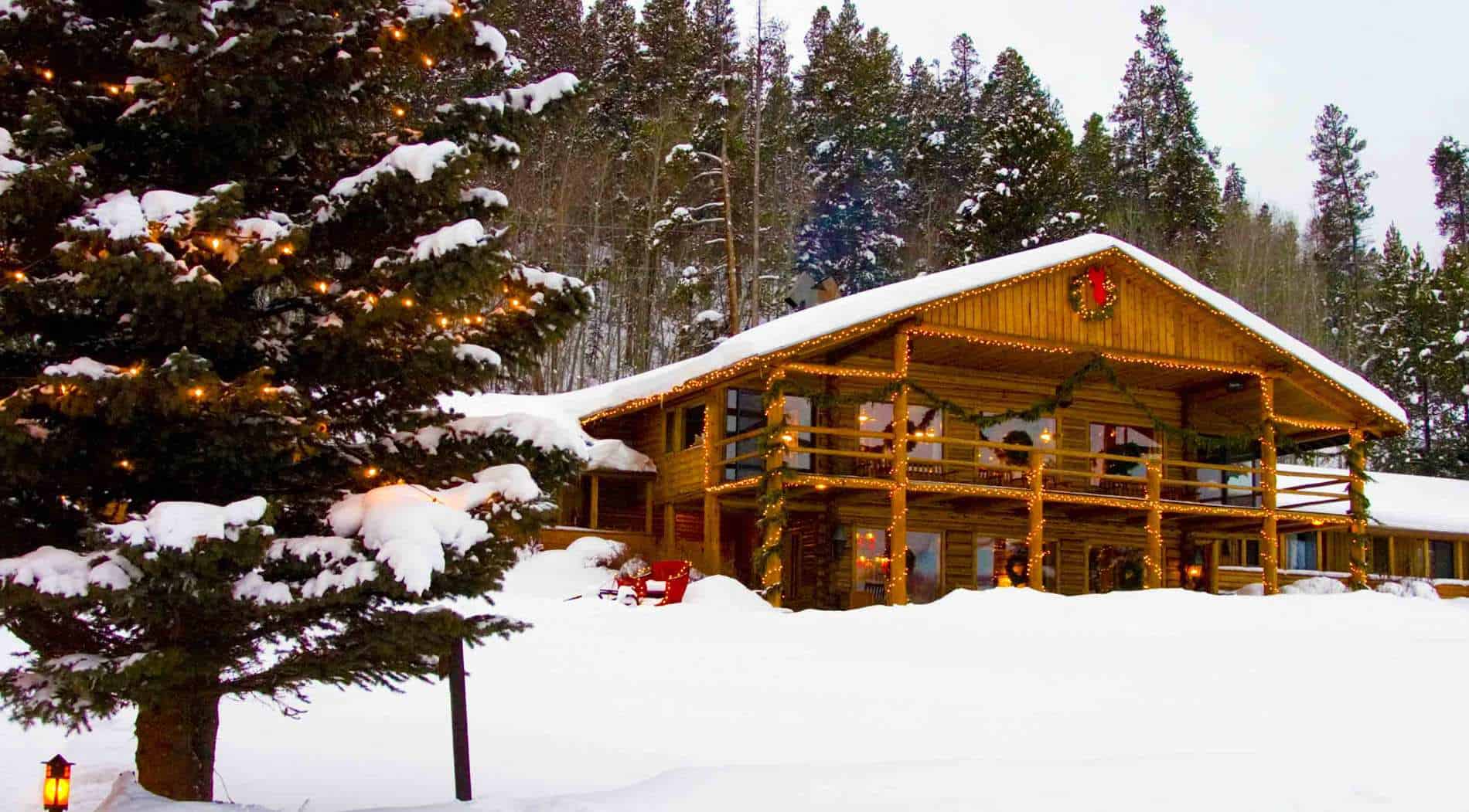 snow on top of cabin