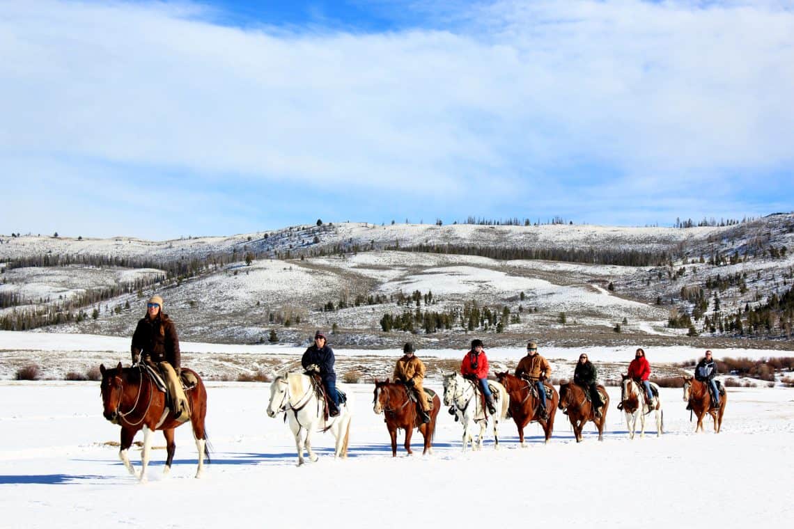 group going on trail in snow