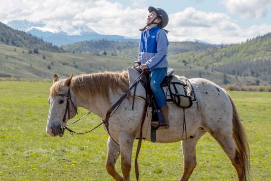 kid-riding-and-laughing