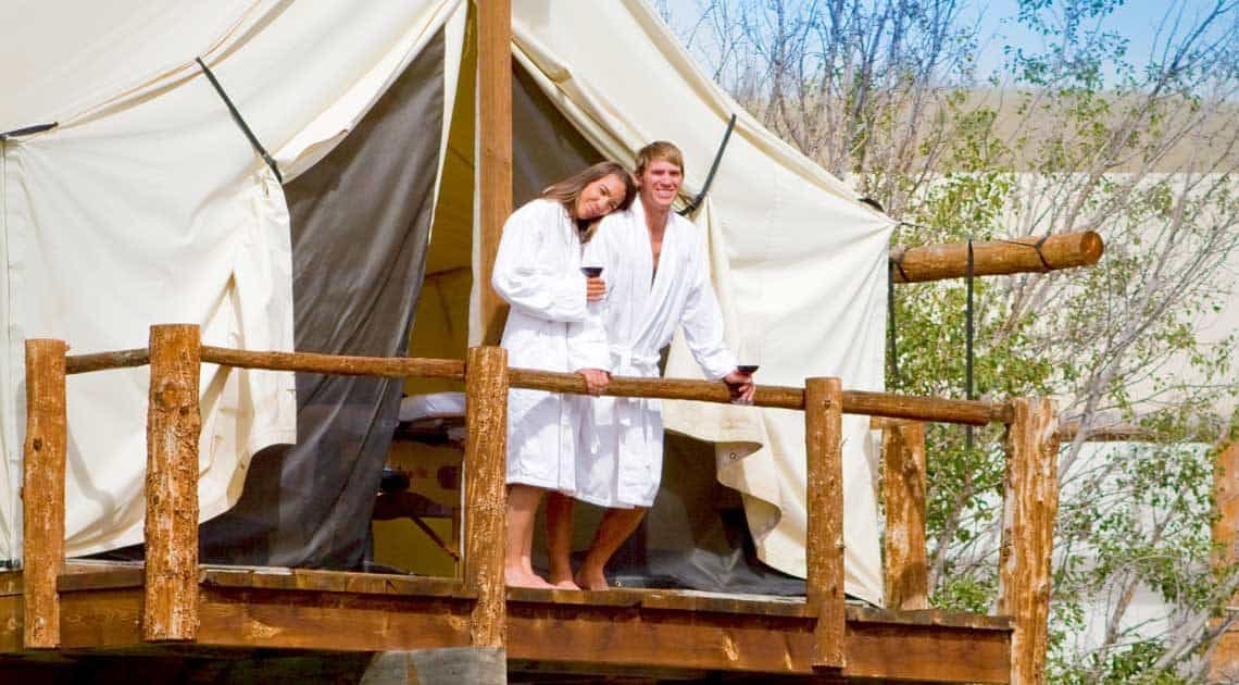 couple on lazy u spa balcony