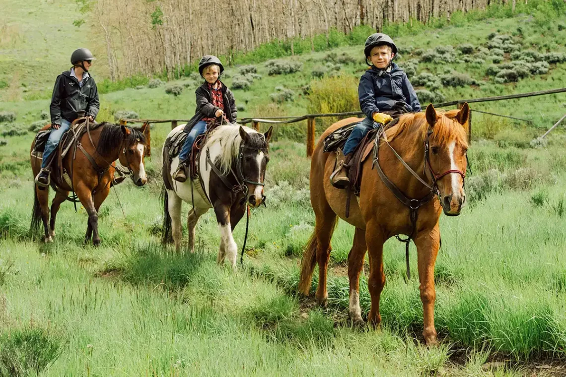 Kids age 6-10 out on their trail ride